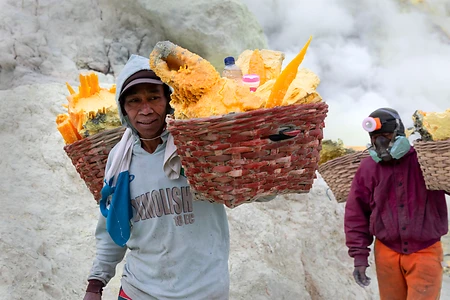 Sulfur mining at the crater of Kawah Ijen on Java