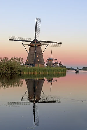 Historic windmill in Kinderdijk, Netherlands. UNESCO World Heritage Site